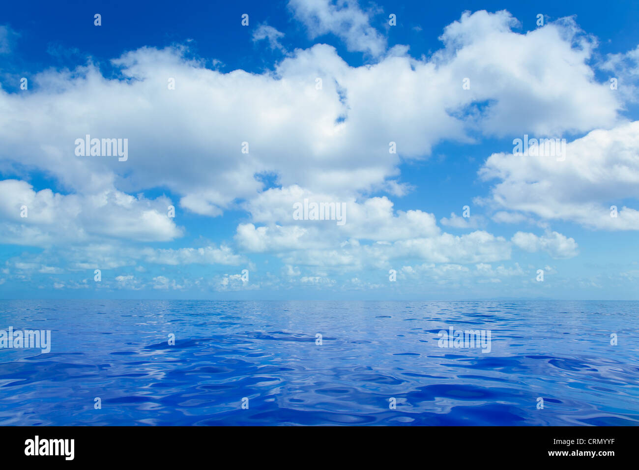 Blue calm sea water in offshore ocean with clouds mirror surface Stock ...