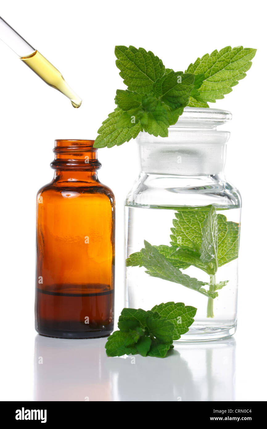 Herbal medicine dropper bottle with mint leaves Stock Photo Alamy