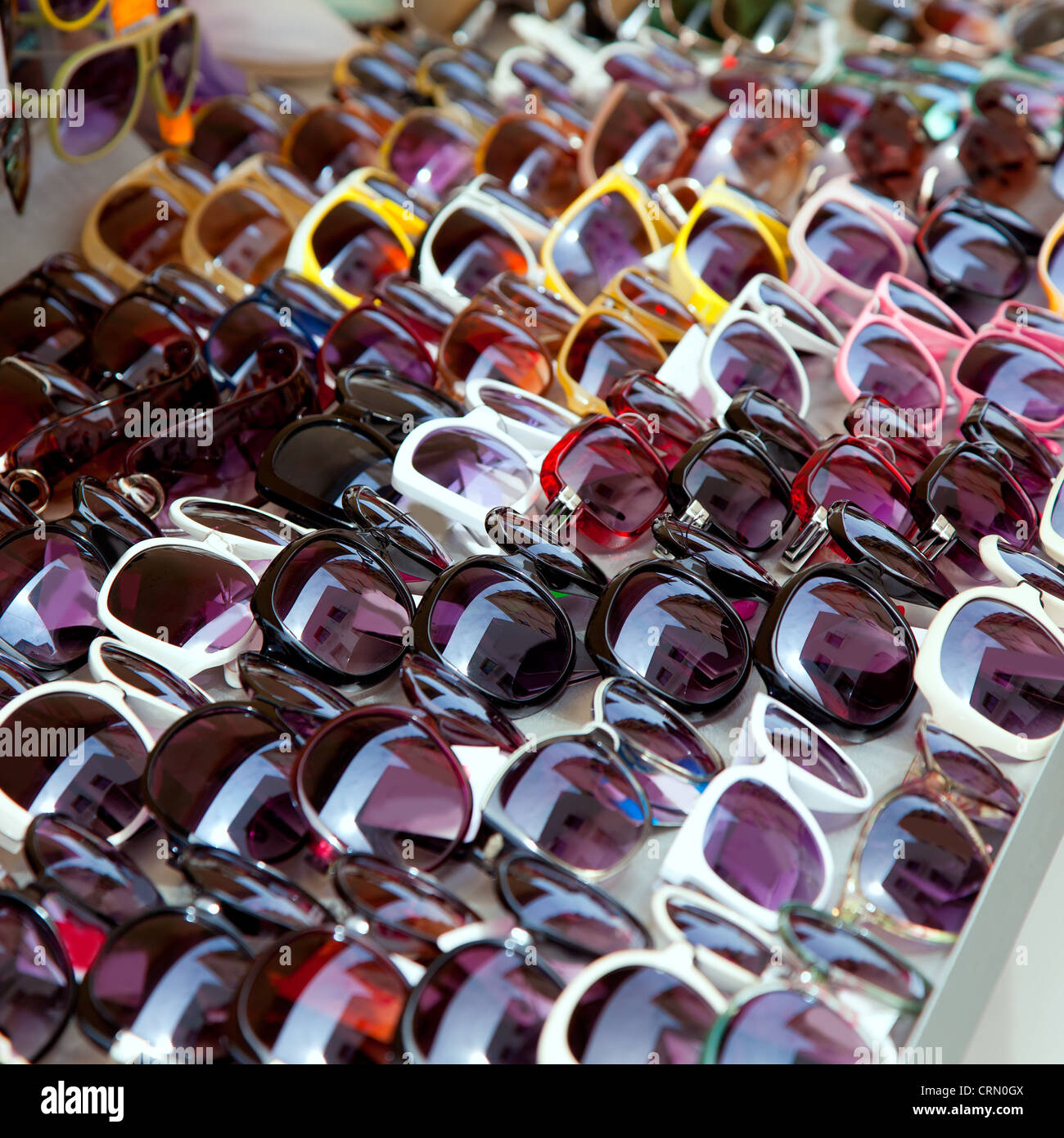 Fashion sunglasses rows in outdoor shop display pattern Stock Photo