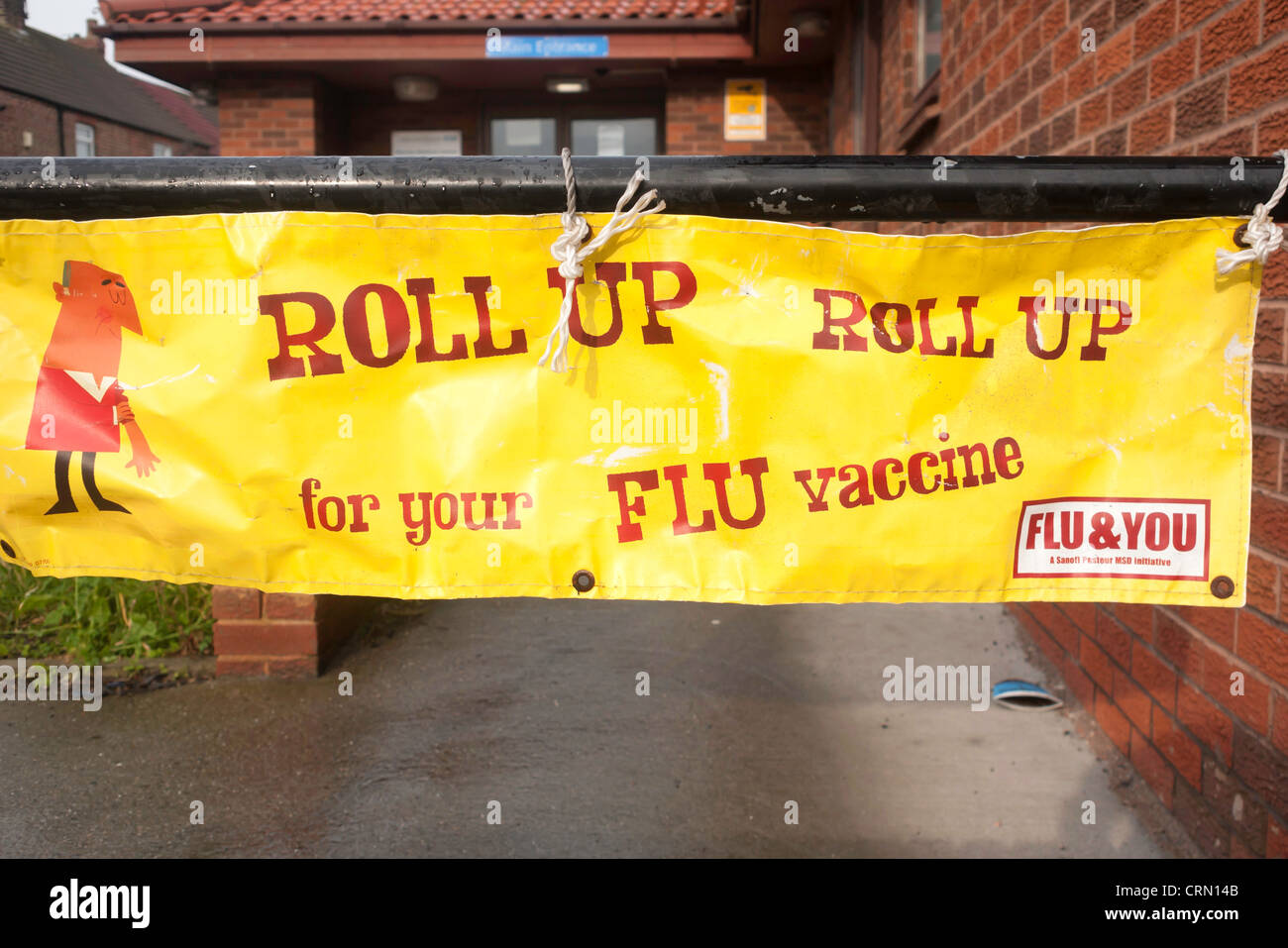 Poster Roll up Roll Up for your Flu Vaccine outside a doctors surgery Stock Photo