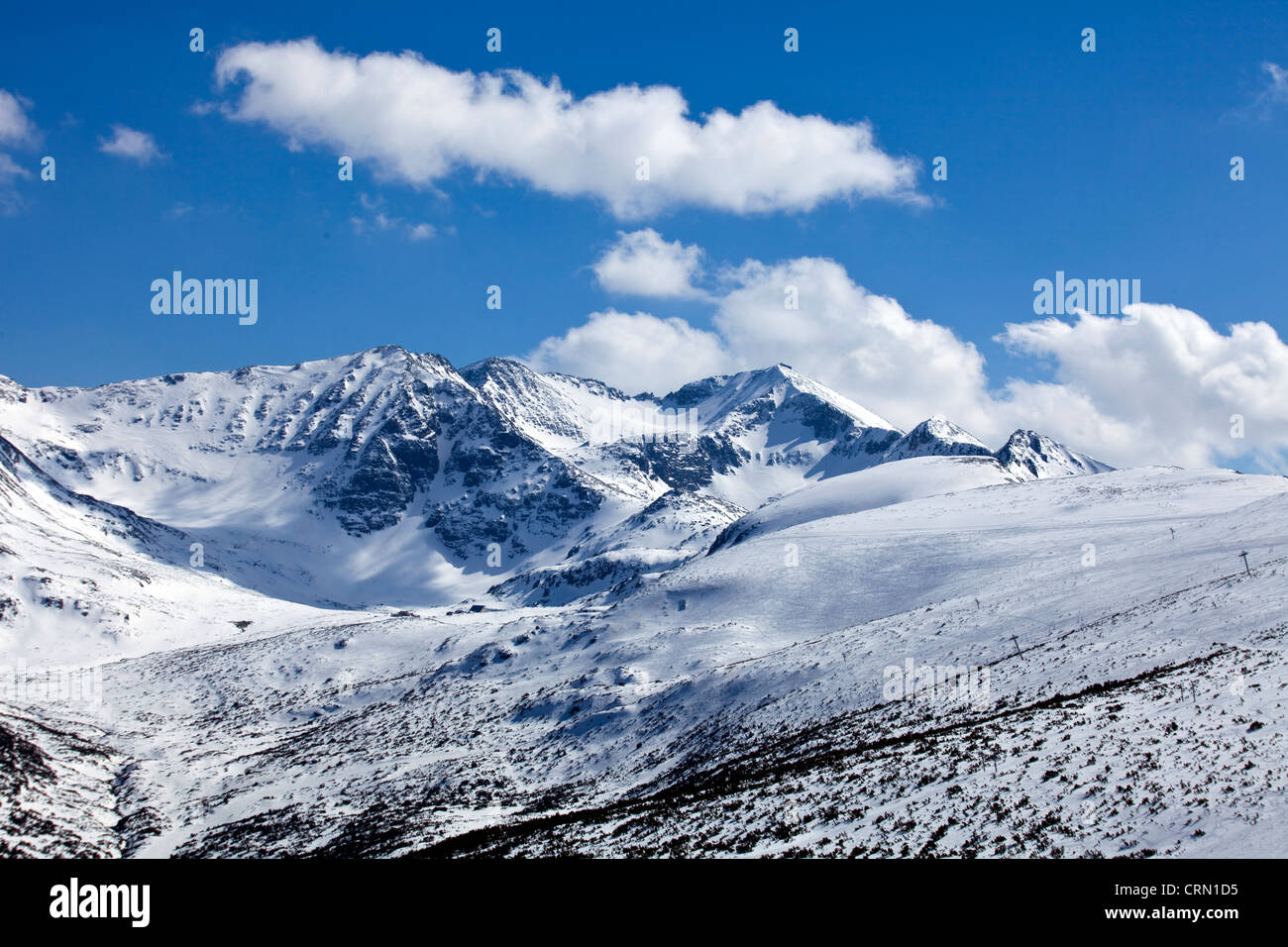 Snow covered mountains of the Pirin National Park in winter near Bansko ...