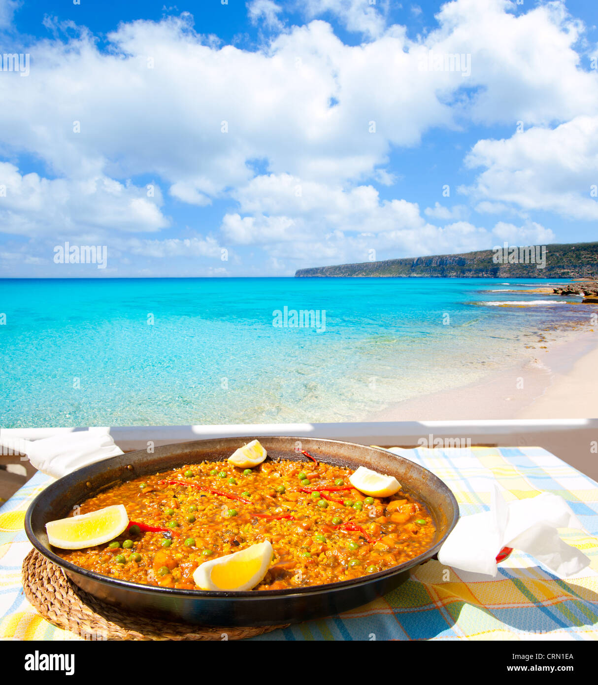 Paella mediterranean rice food by the Balearic Formentera island beach Stock Photo