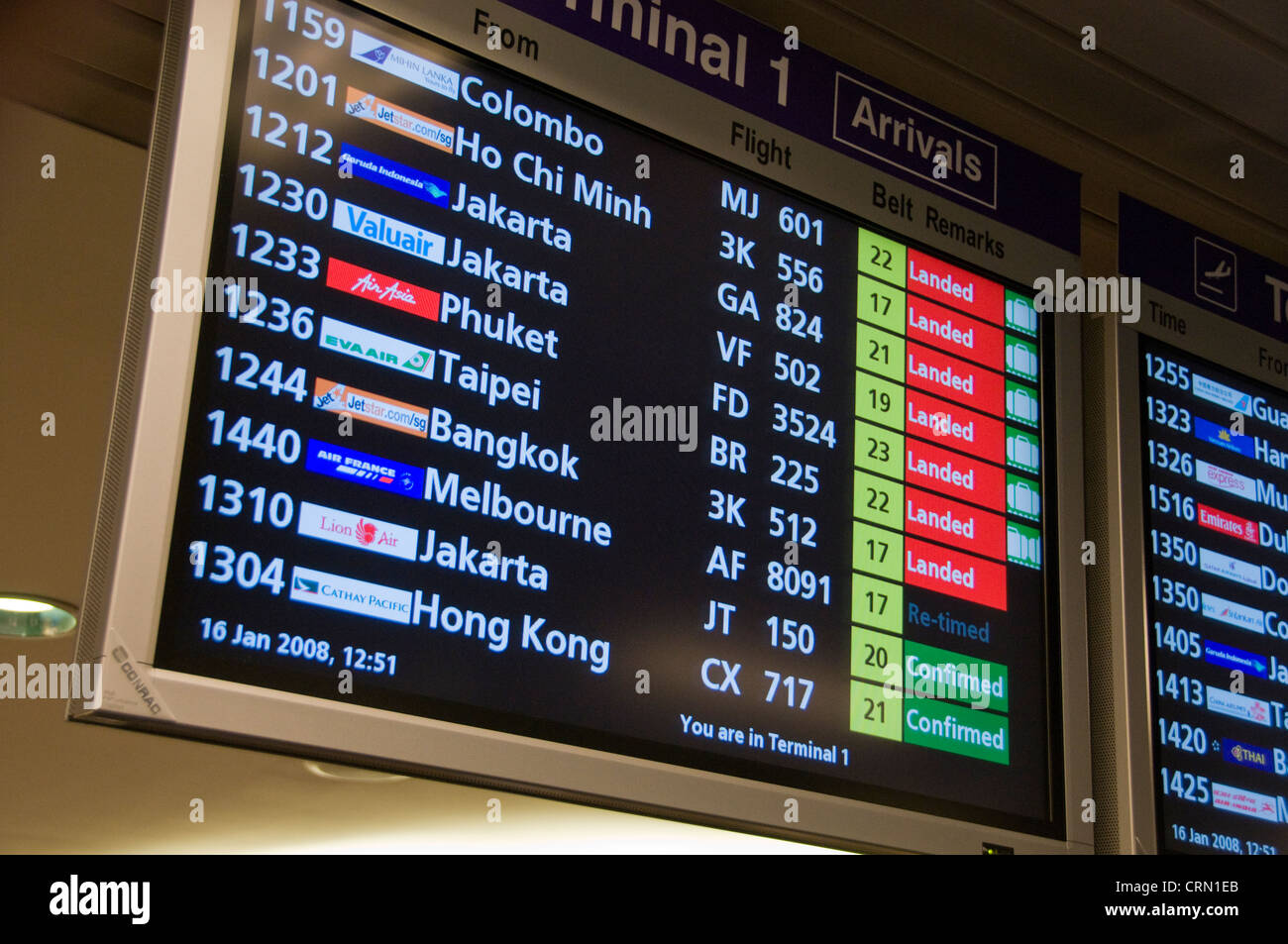 Flatscreen CRT monitors for departure and arrival times at new modern Changi airport in Singapore southeast Asia Stock Photo