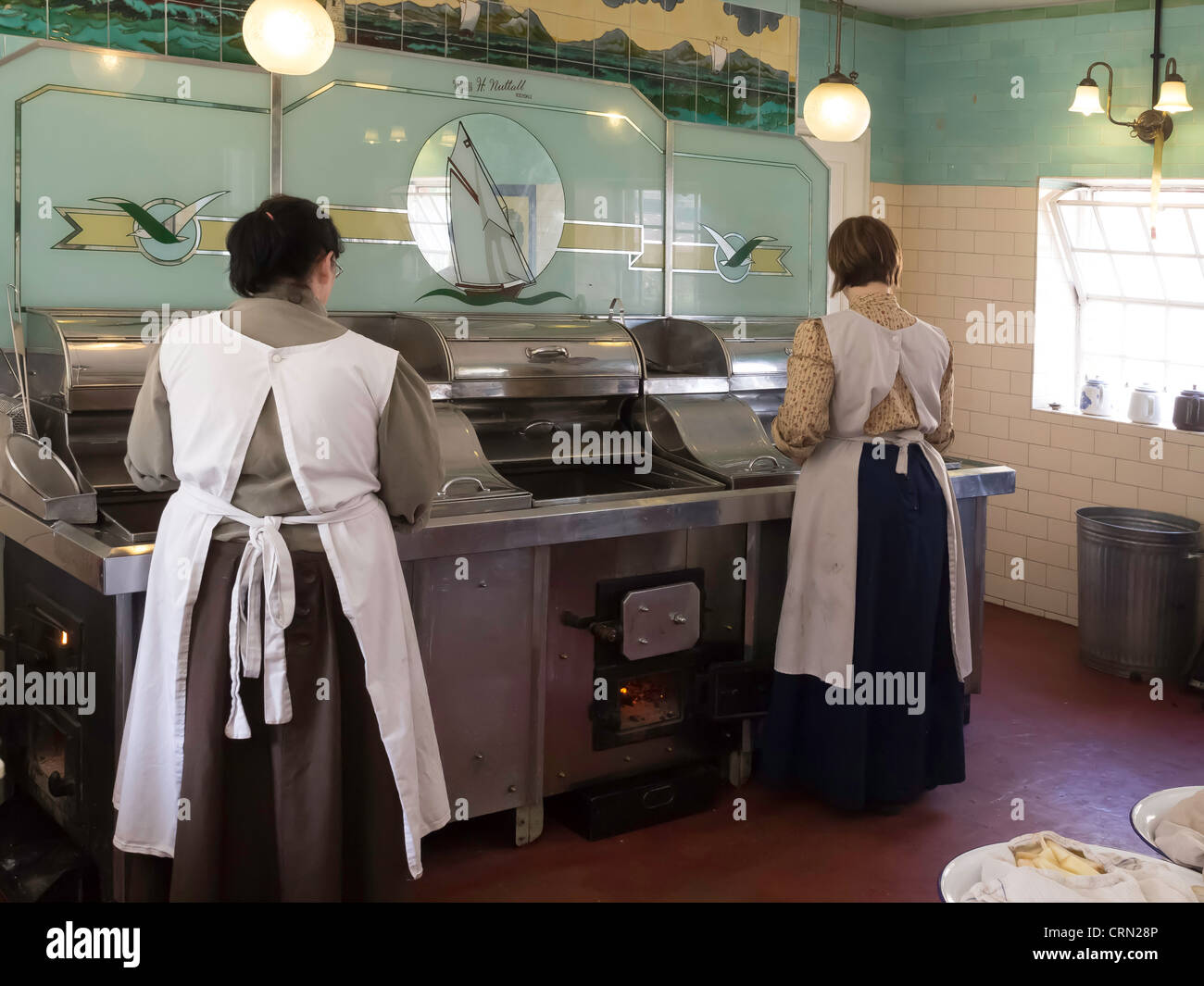 Interior of Davy's Fish and Chip shop at Beamish Museum of Northern Life with women cooking on a