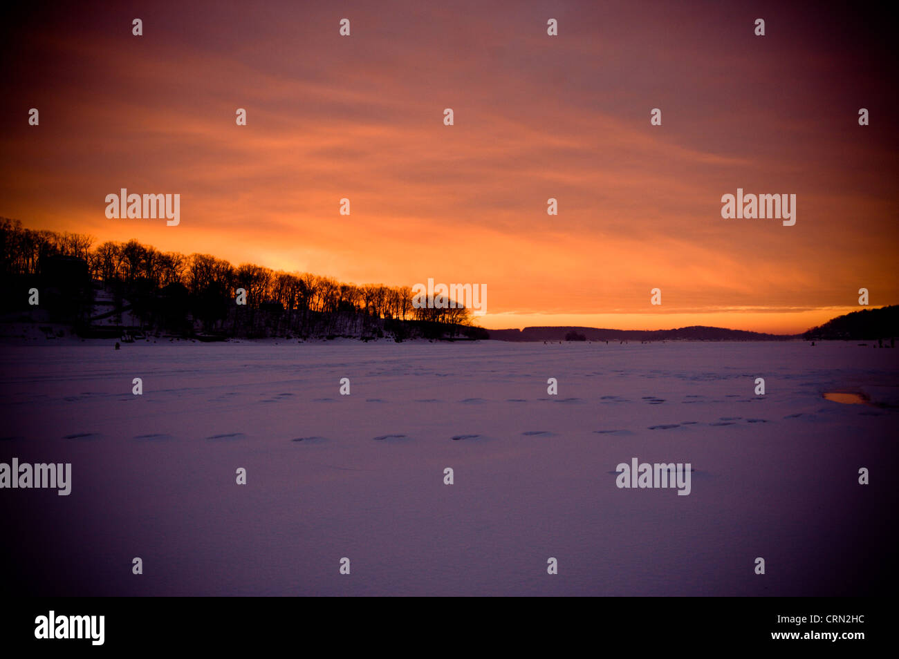 Sunrise on a frozen lake Stock Photo