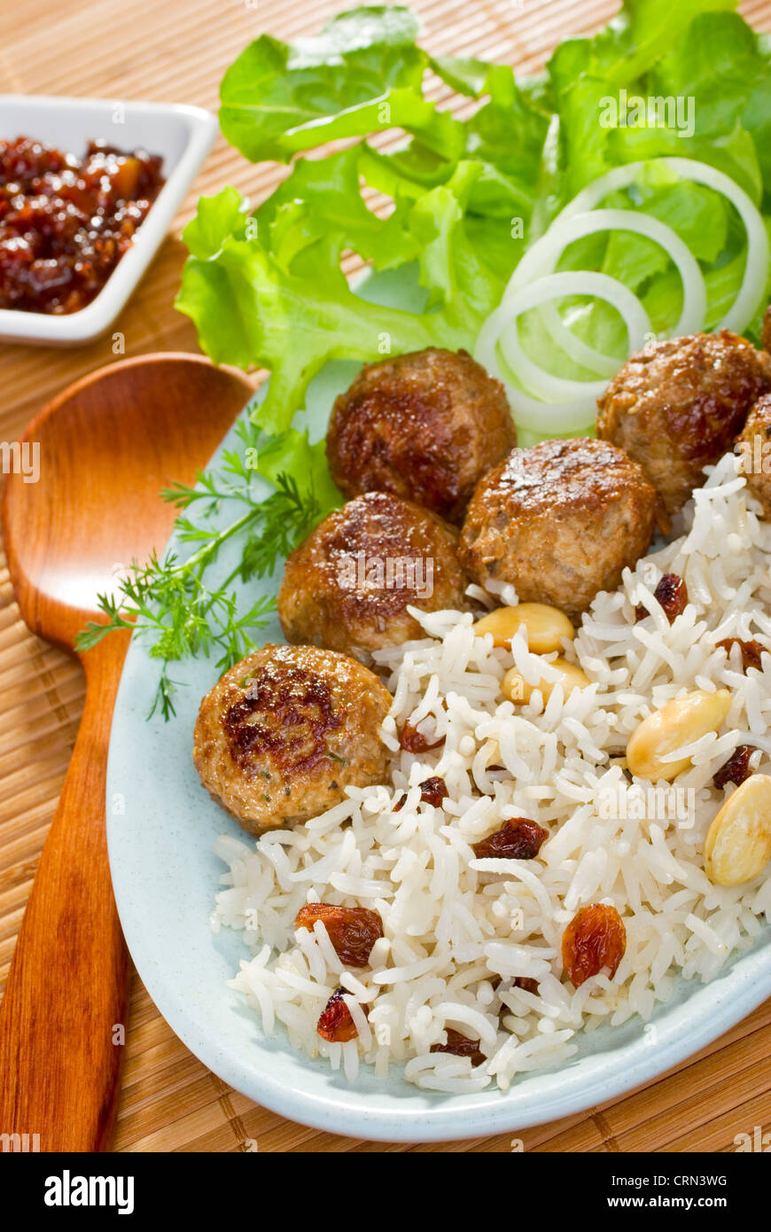 Spicy Indian lamb koftas or meatballs, with basmati rice with fruit and