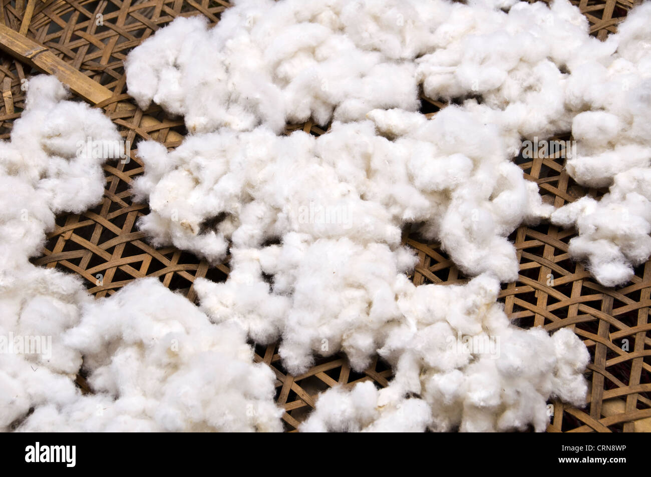 Cotton drying in a basket, Guizhou province - China Stock Photo