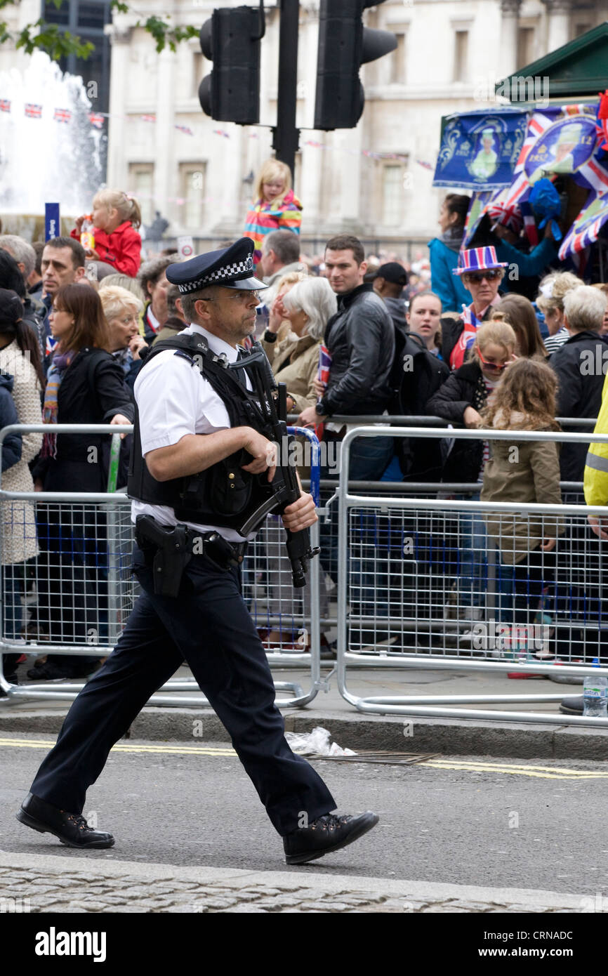 Armed Police Officers on the streets of London England Metropolitan Police Service Stock Photo