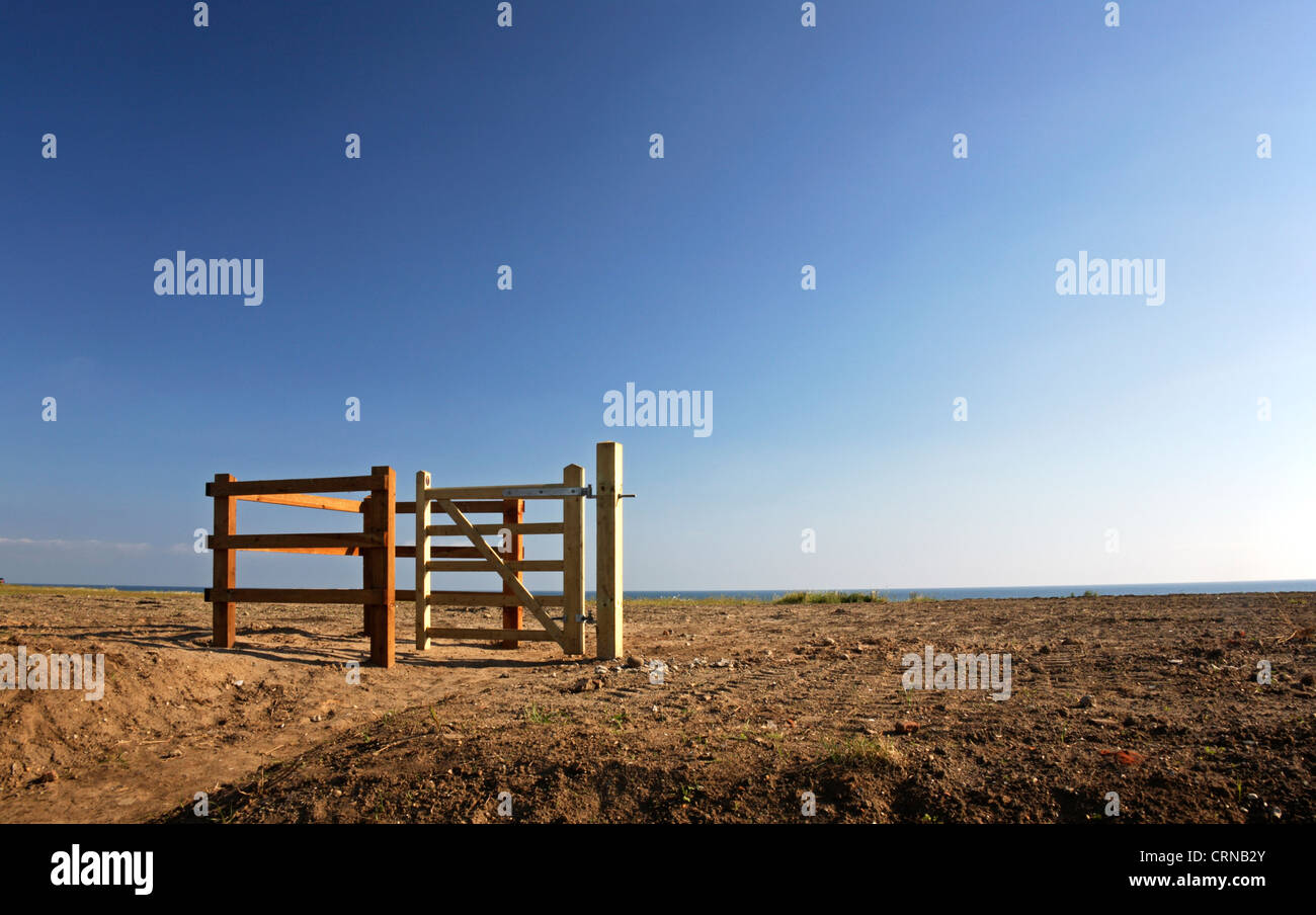 An access gateway installed on cleared land on the cliff top at Happisburgh, Norfolk, England, United Kingdom. Stock Photo