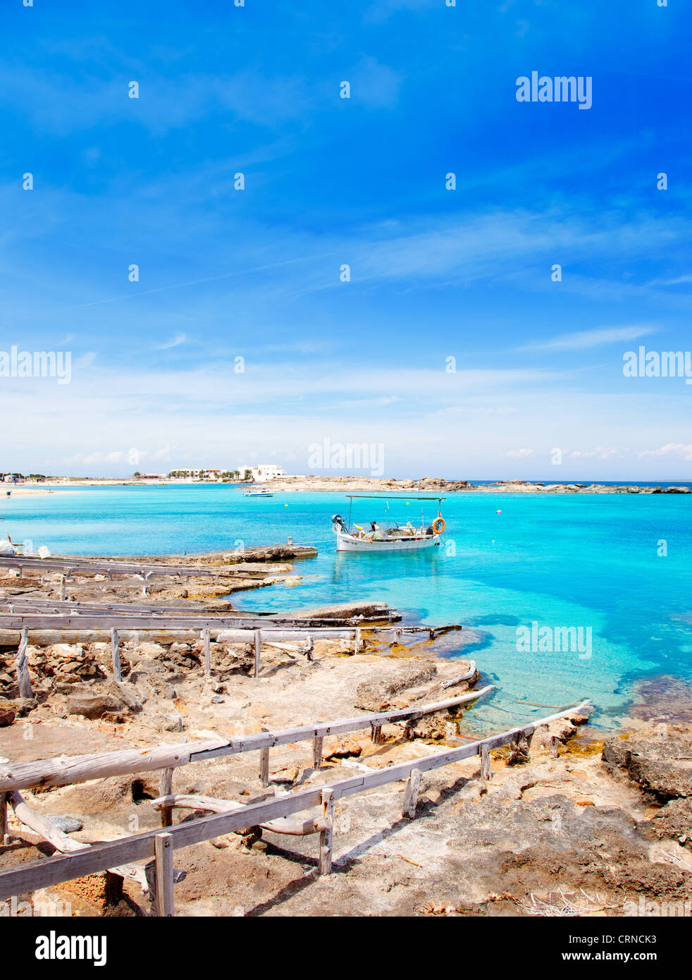 Els Pujols beach in Formentera with traditional fishing boat in summer day Stock Photo