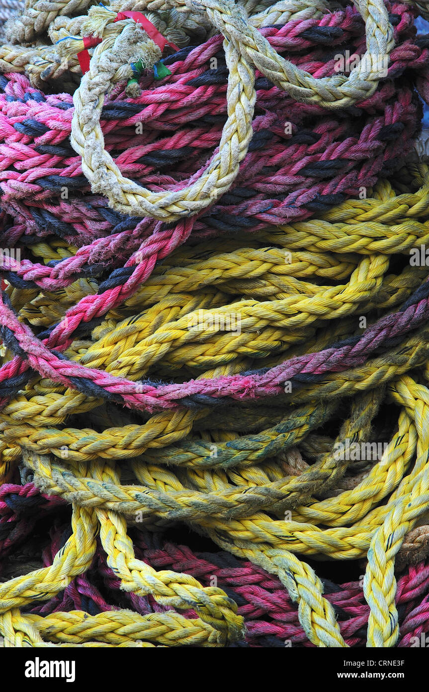 Different coloured fishing rope in a pile UK Stock Photo