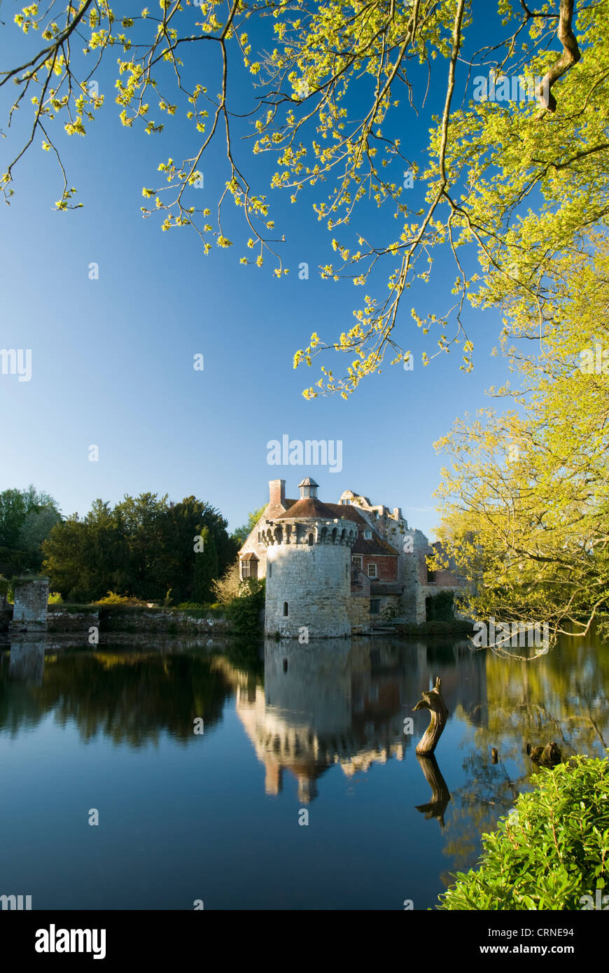 Scotney Castle, a 14th century medieval castle reflected in the moat. Stock Photo