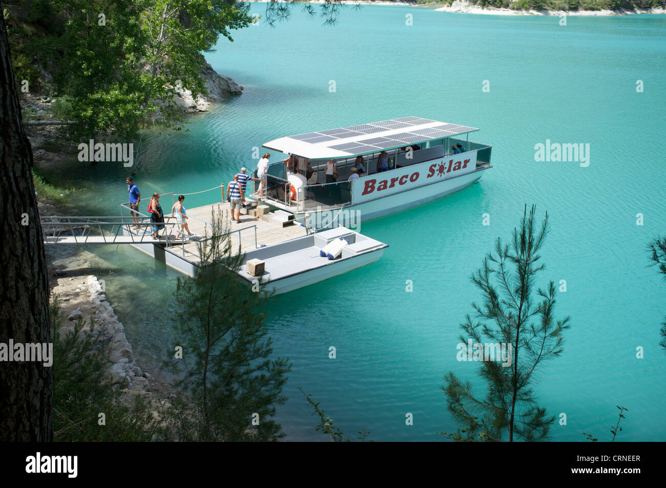 Barco Solar, Solar powered boat on reservoir below Guadalest, Alicante, Spain Stock Photo