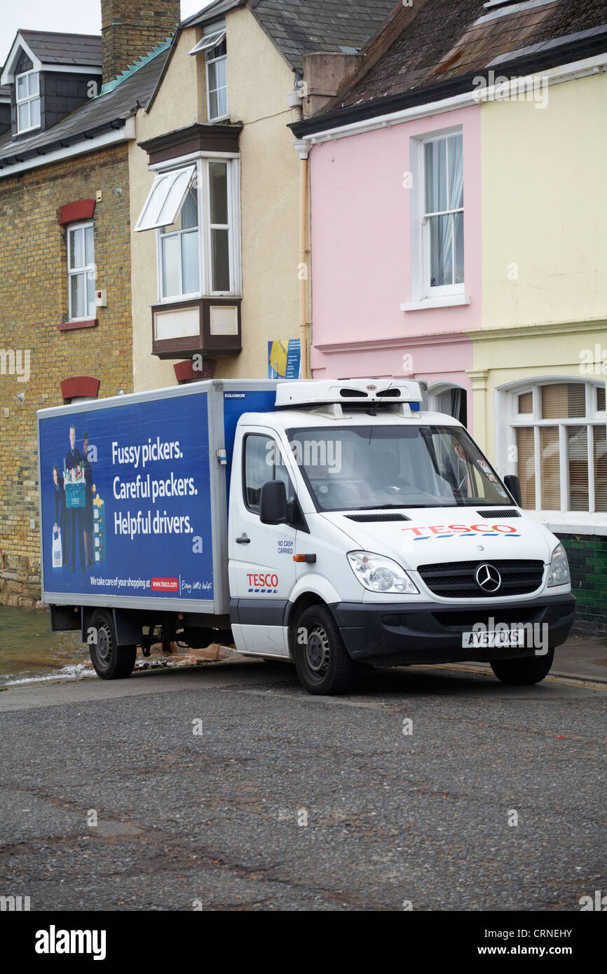 Tesco home delivery van parked outside houses at Cowes, Isle of Wight, Hampshire UK in June Stock Photo