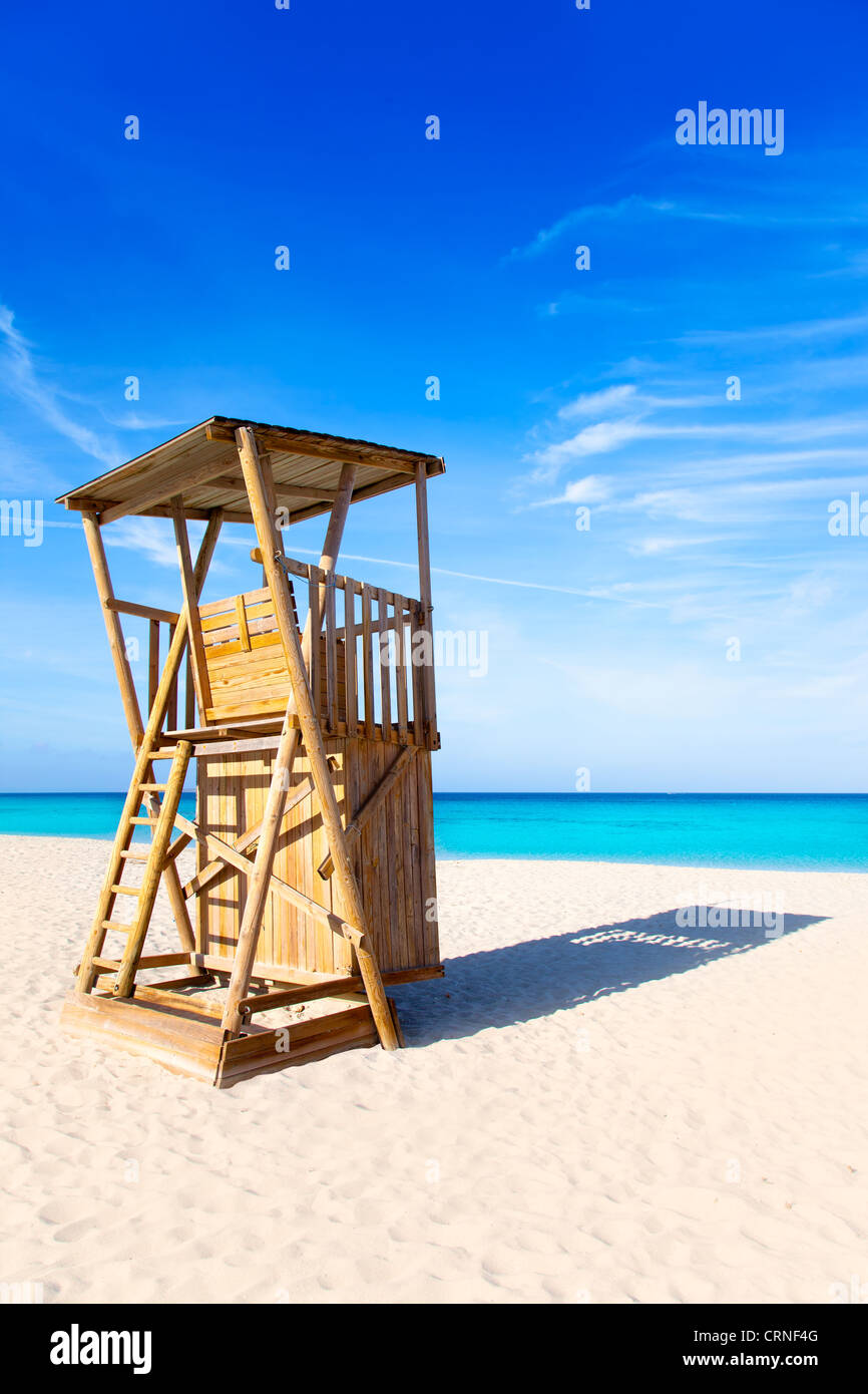 Formentera Llevant beach lifeguard house in white sand and turquoise idyllic water Stock Photo