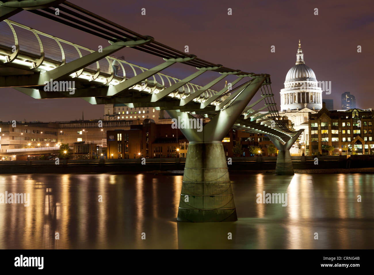 The Millennium Bridge spanning the River Thames between Bankside on the South Bank and St Paul's Cathedral on the North Bank. Stock Photo
