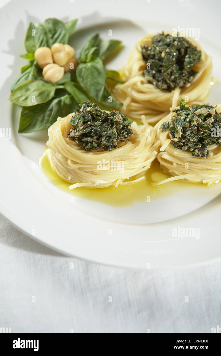 Pesto pasta with macadamia nuts Stock Photo Alamy
