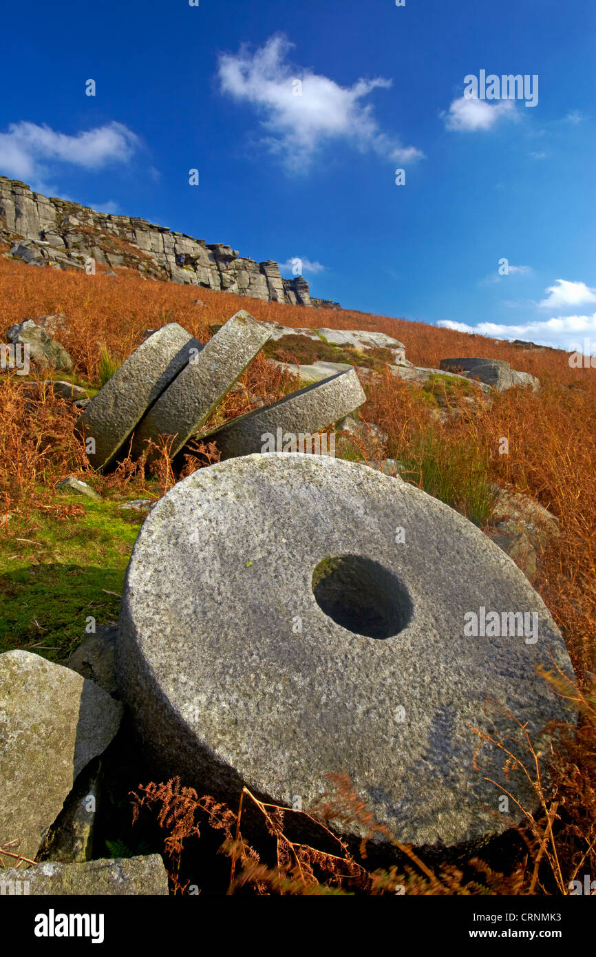 Abandoned millstones below High Neb on Stanage Edge in the Peak District National Park. Stock Photo
