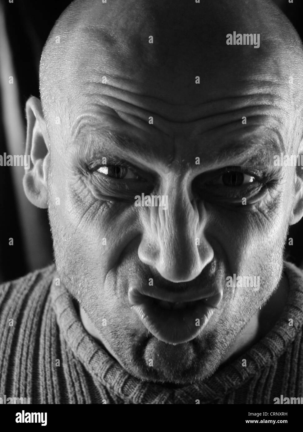 Man pulling faces Stock Photo Alamy