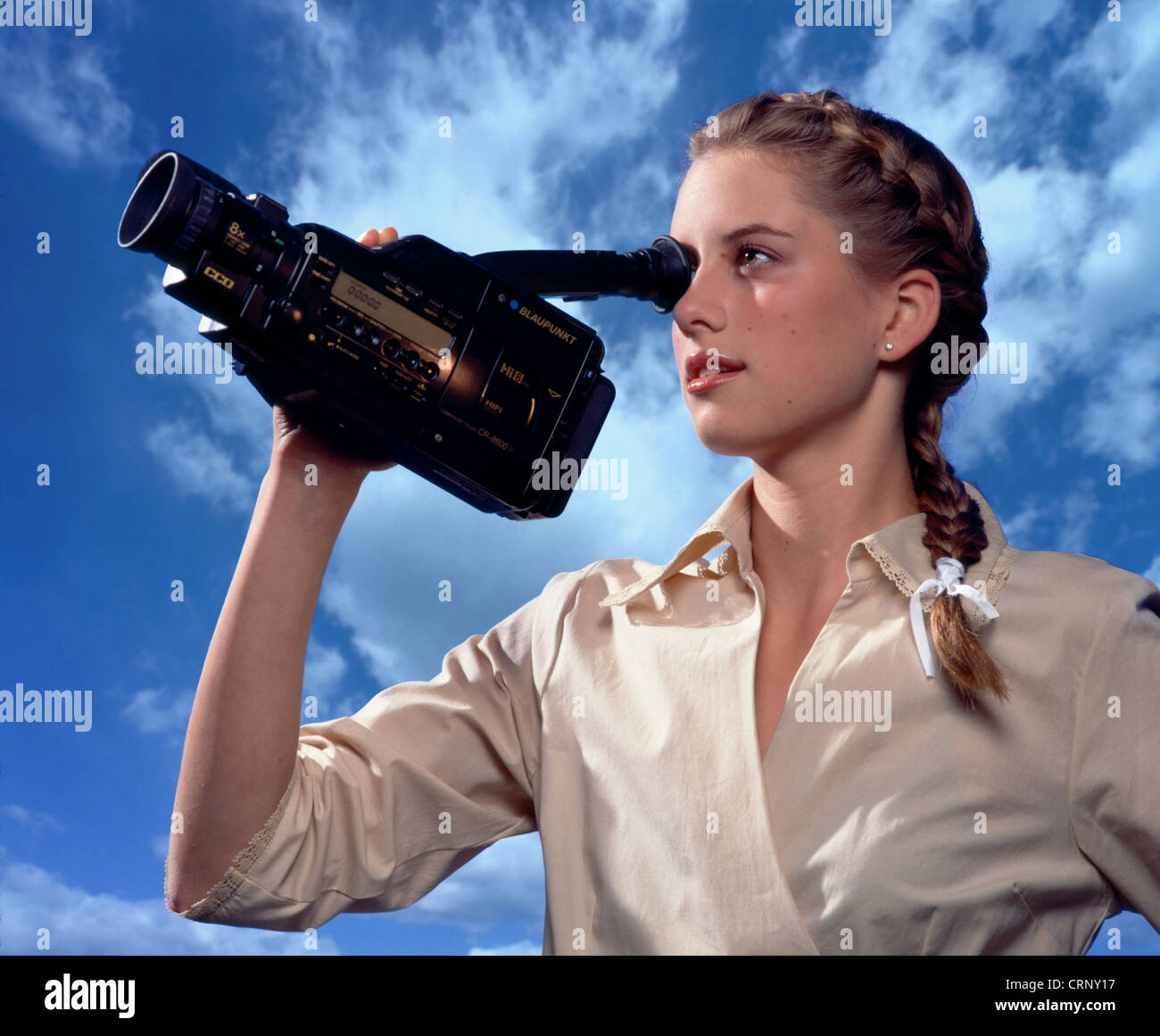 Woman filming with Super 8 camera Stock Photo