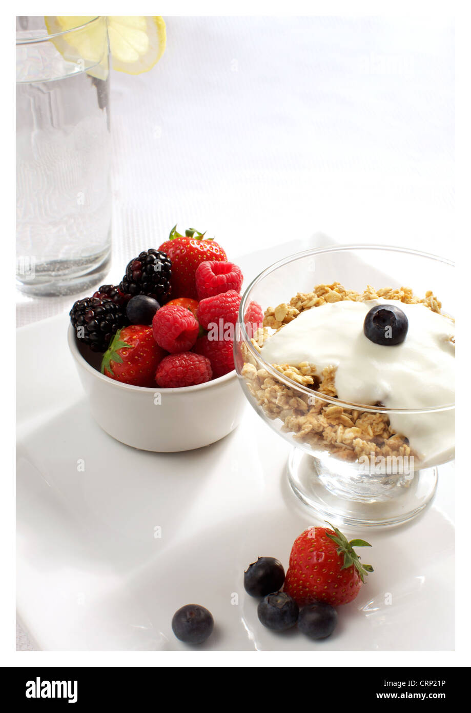 Healthy Breakfast with yogurt, granola & berries Stock Photo