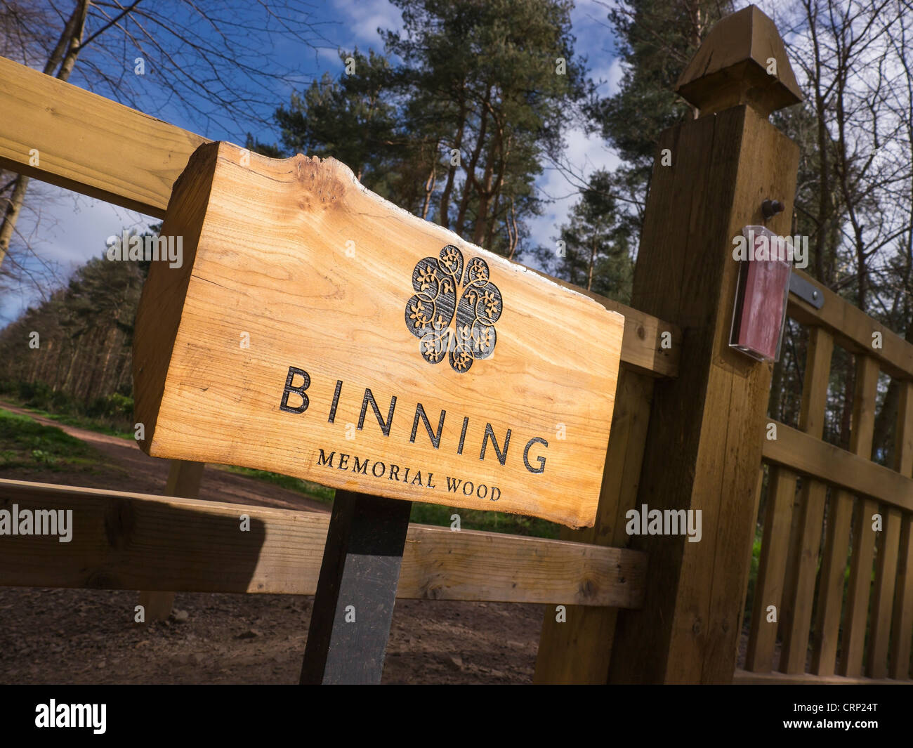 A wooden sign at the entrance gate to the Binning Memorial Woodland burial site, East Lothian, Scotland. Stock Photo