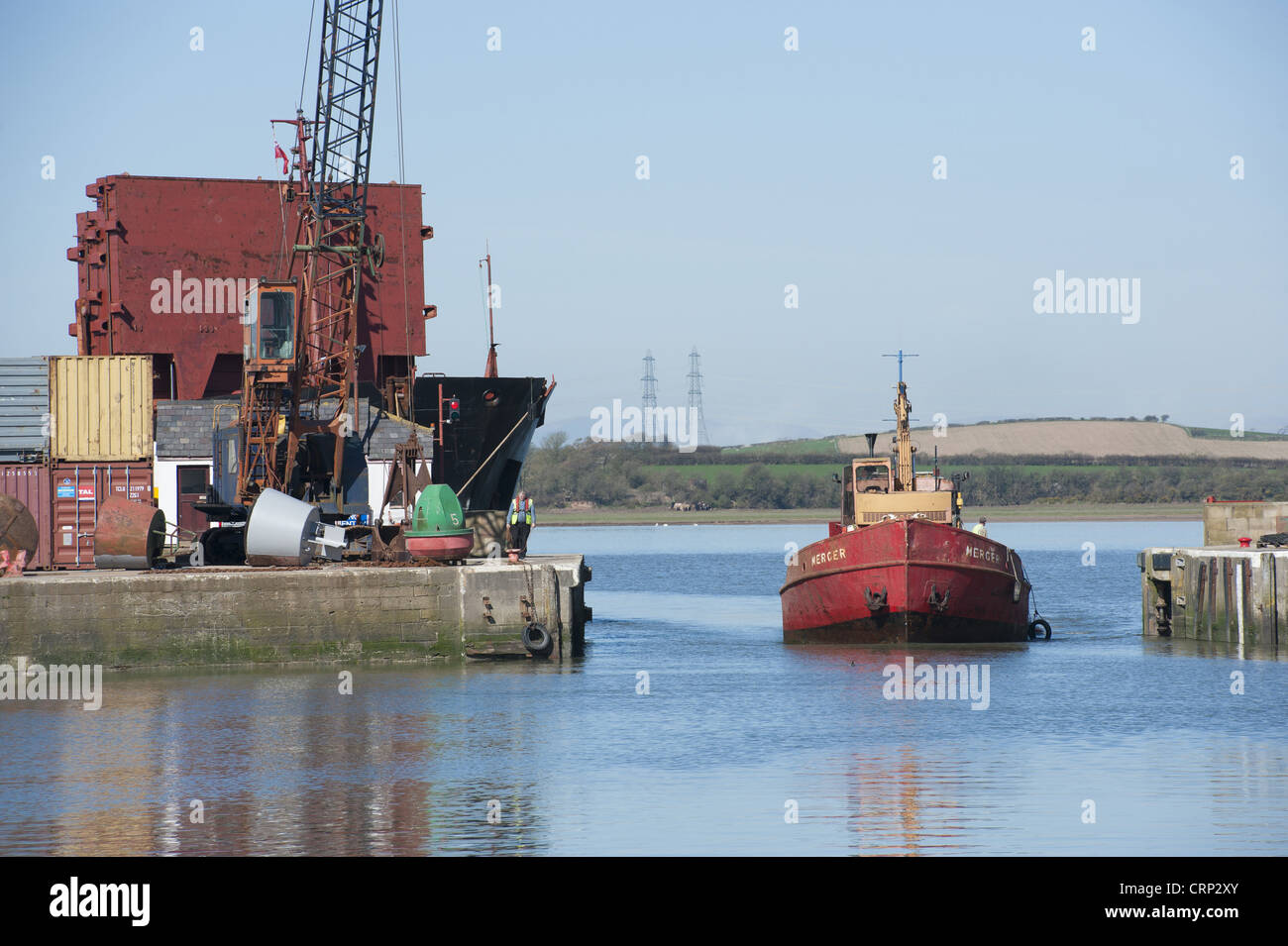 Boat entering dock, Glasson Dock, River Lune, Lancaster, Lancashire, England, march Stock Photo