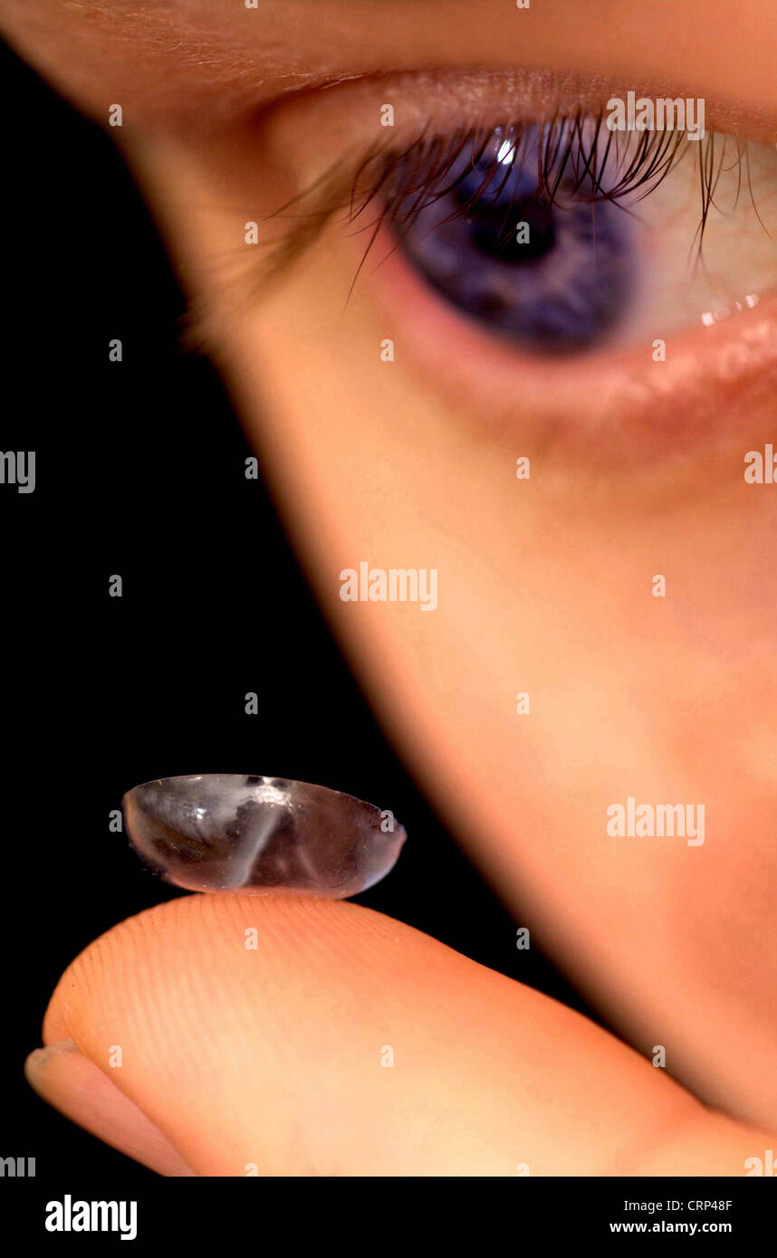 A man with a contact lens. Stock Photo
