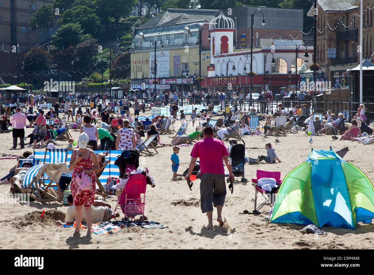 South Bay Beach in Scarborough packed with summer tourists. Stock Photo