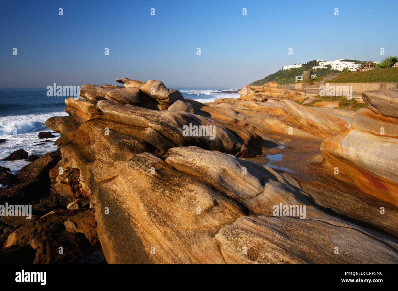 Sandstone cliffs overlooking the sea at Thompson's Bay, Ballito, Kwazulu Natal, South Africa Stock Photo