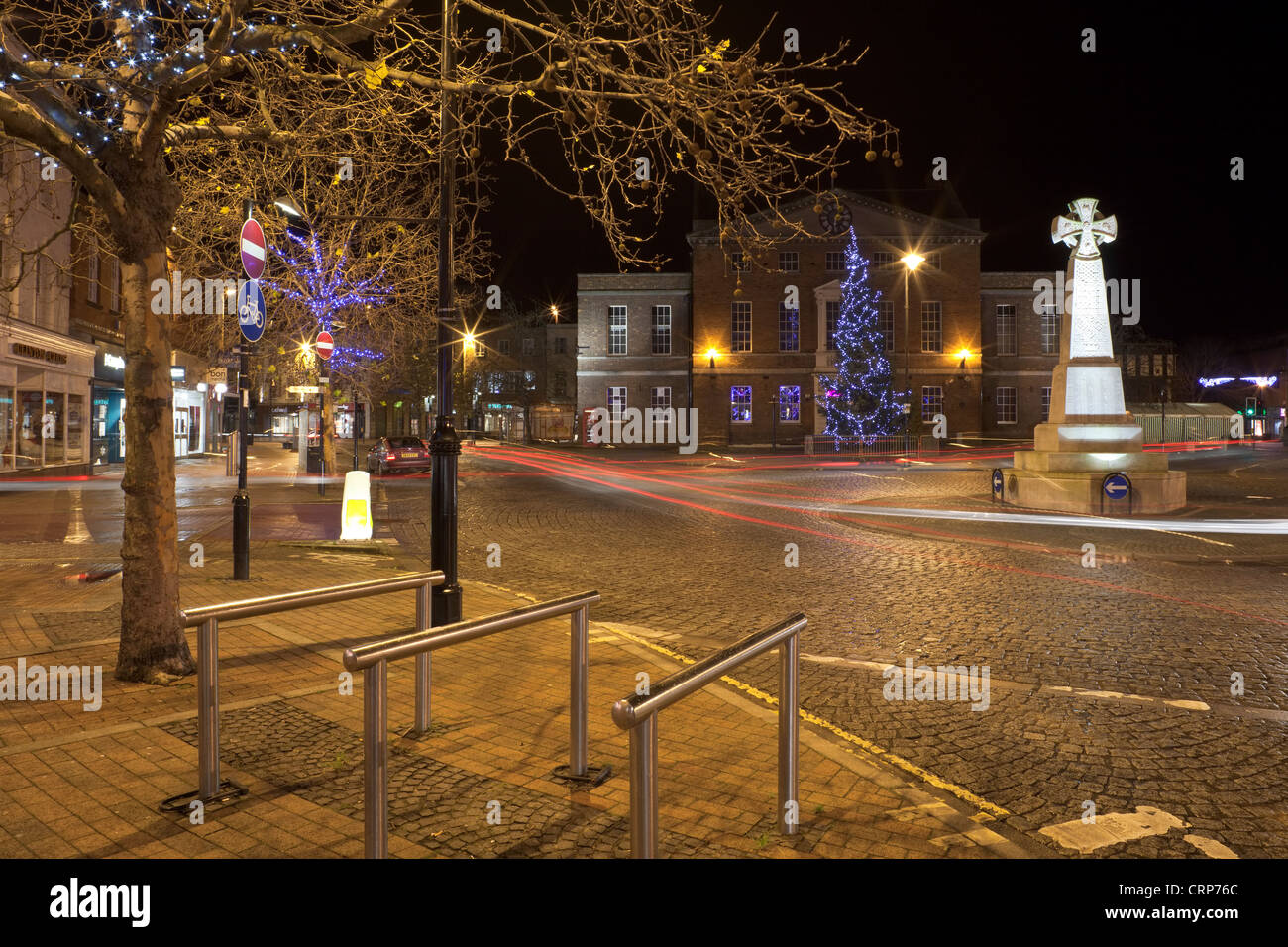 A large Christmas tree decorated with lights in front of the Market House in Taunton town centre. Stock Photo
