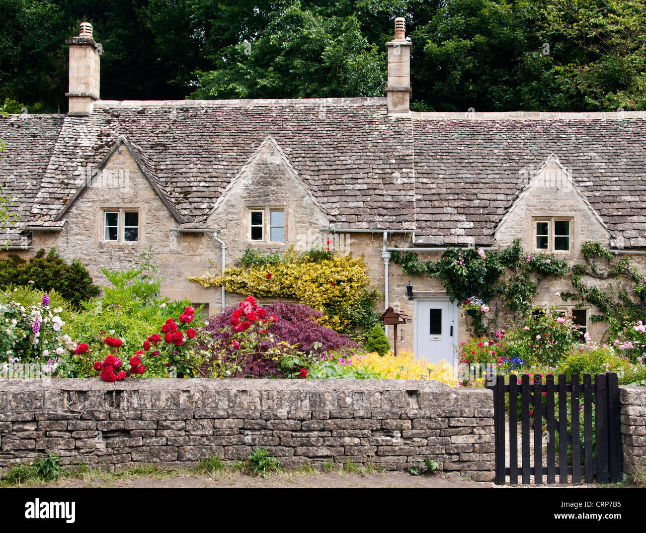 Traditional stone cottages in the Cotswolds. Stock Photo