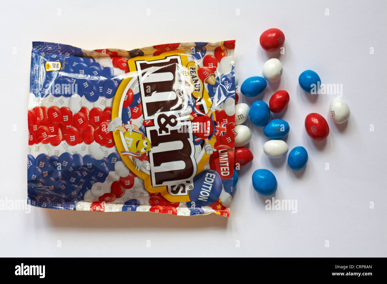 A packet of chocolate peanut m & m's on a white background Stock Photo -  Alamy