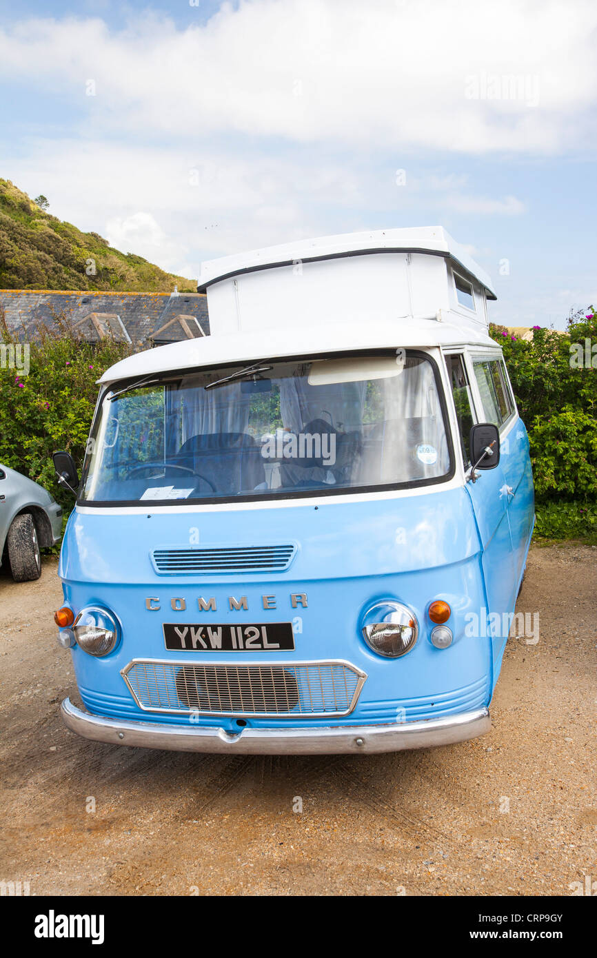An old vintage Commer camper van in Lulworth on the Dorset coast Stock
