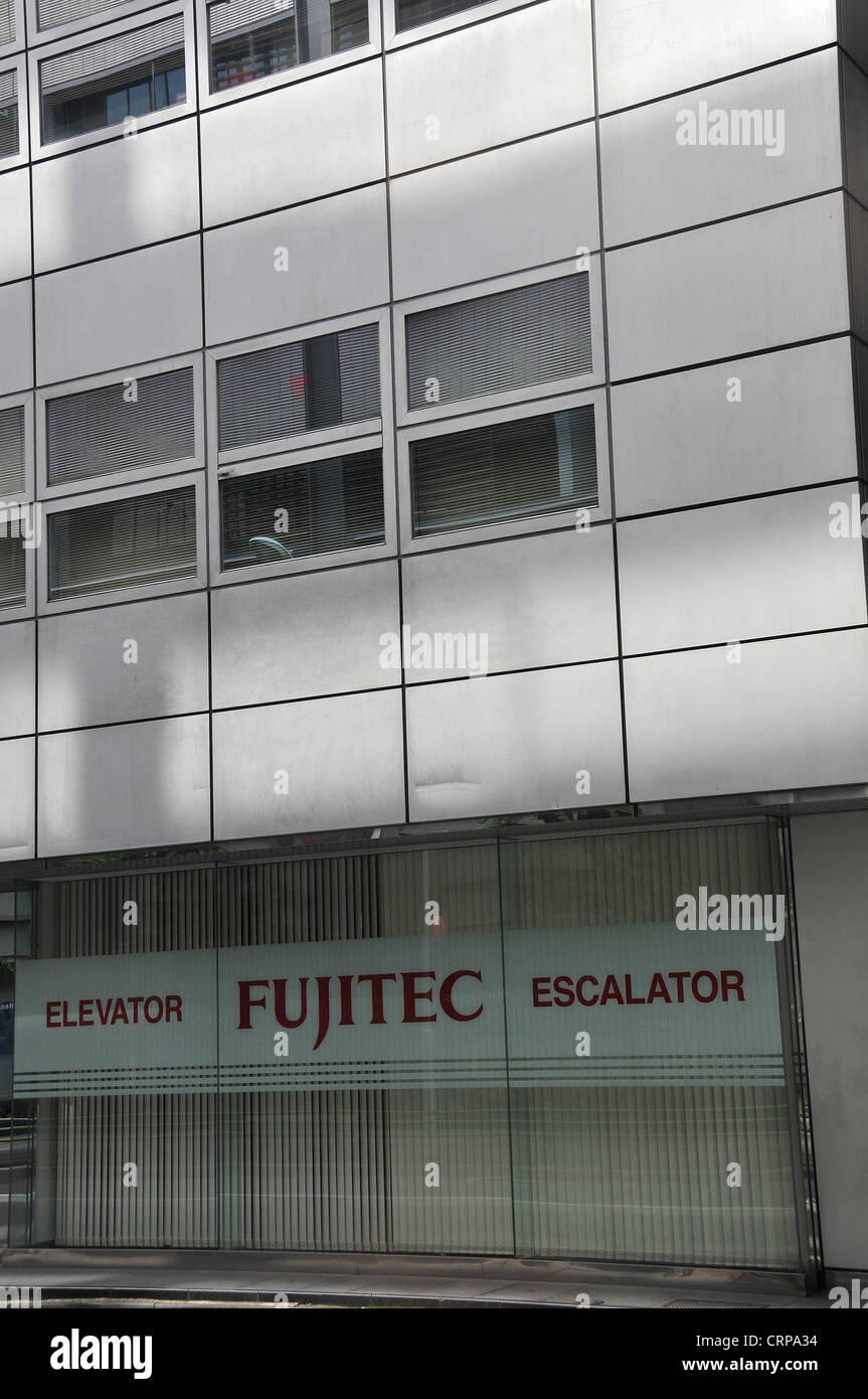 Fujitec elevator escalator building Ginza Tokyo Japan Stock Photo