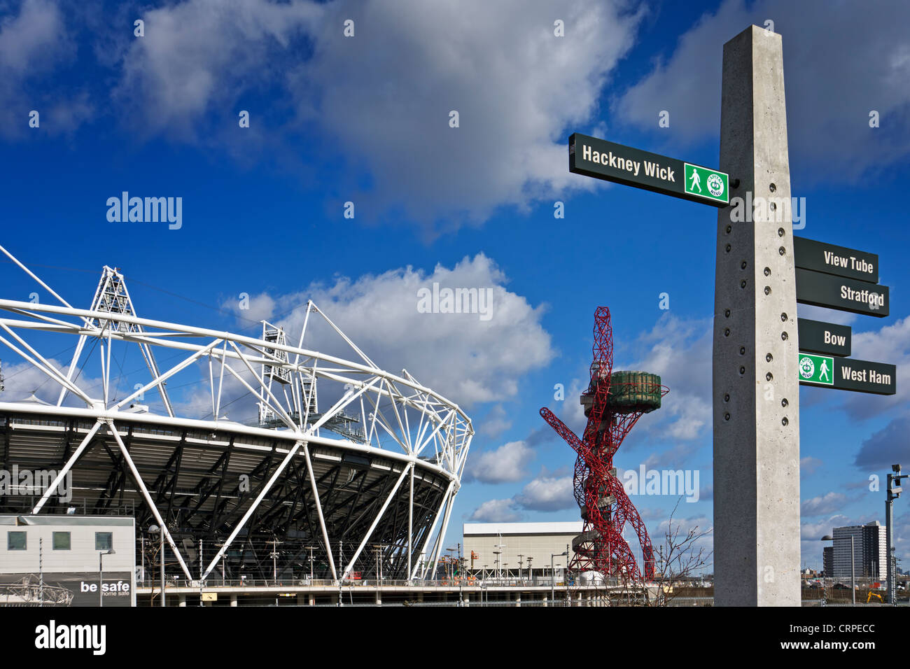 The Olympic Stadium, ArcelorMittal Orbit and a directional signpost. Stock Photo