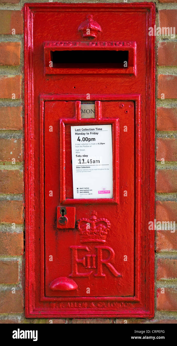 A traditional wall mounted Post box in Brent Pelham. Stock Photo