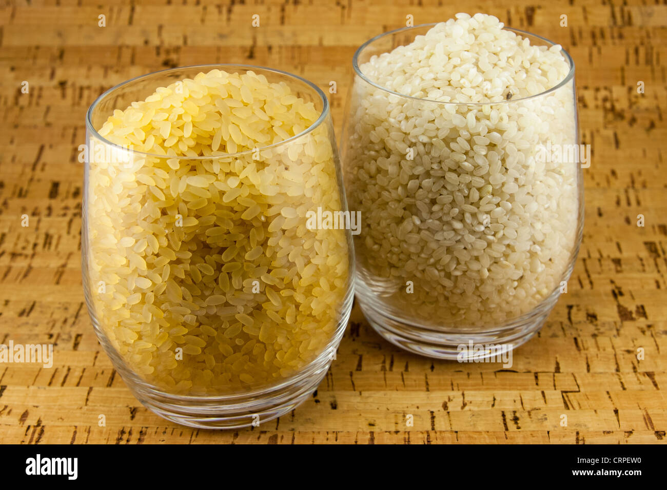 Two varieties of rice inside two transparent glasses Stock Photo - Alamy