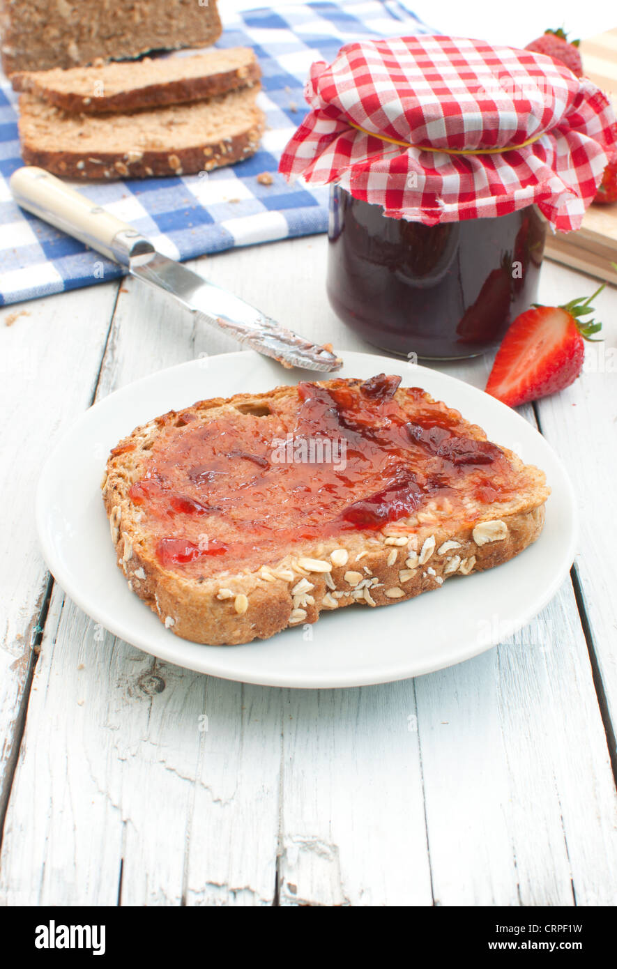 Traditional homemade jam and strawberries Stock Photo
