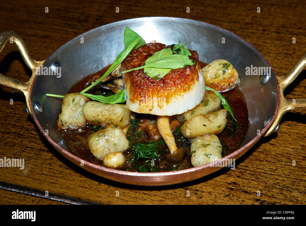 Seared scallop gnocchi spinach wild mushroom copper bottom pan entree