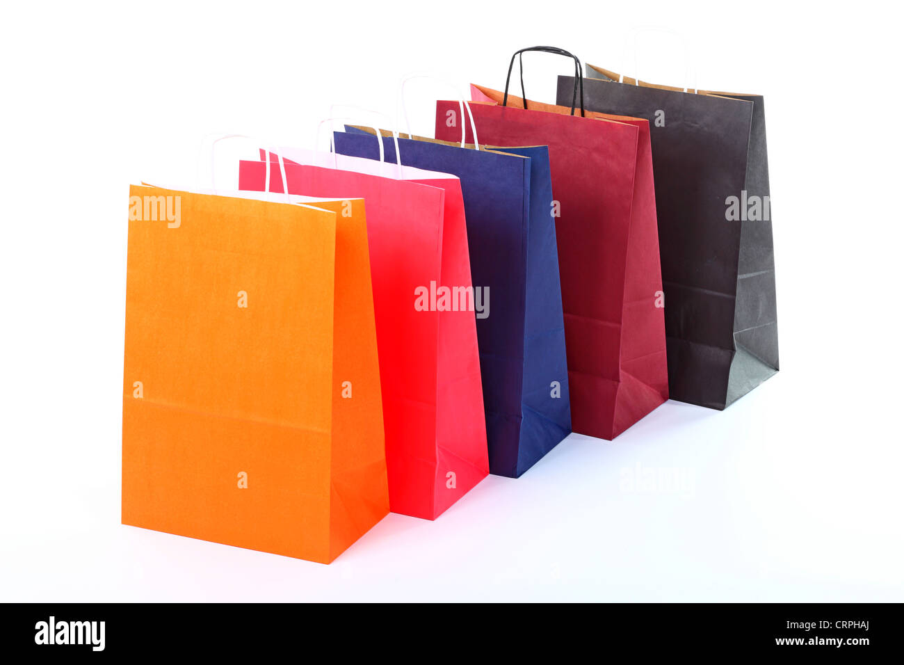Shopping colorful eco gift bags isolated on white background Stock Photo
