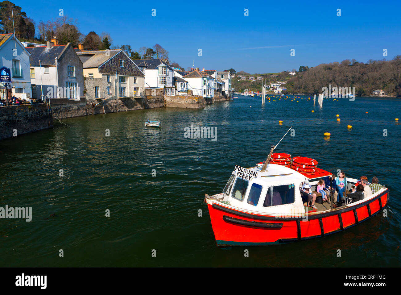 The Polruan Ferry, a passenger ferry that runs between the town of Fowey and village of Polruan at the mouth of the River Fowey. Stock Photo