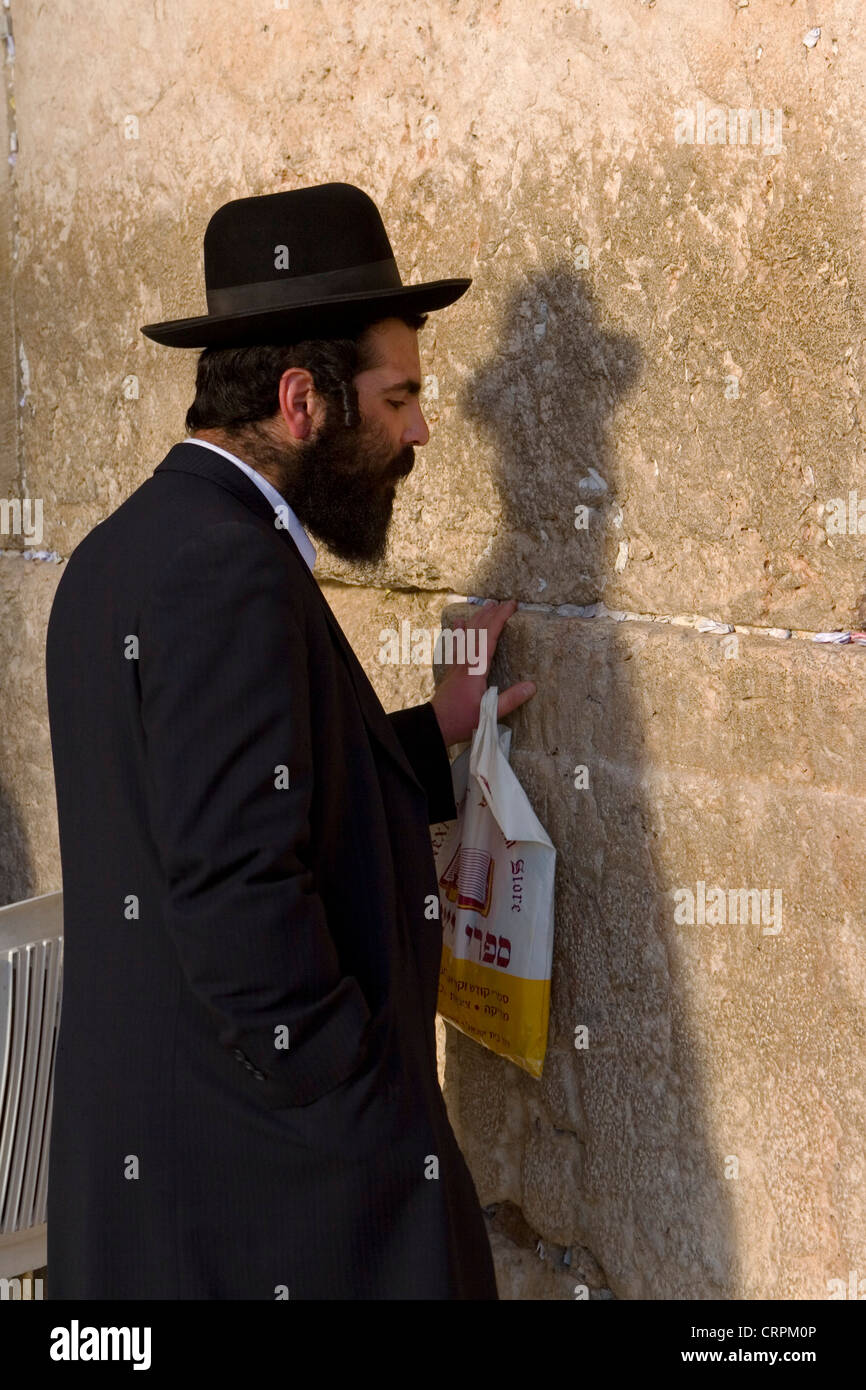 Hassidic Jew worships at the Old City's Western Wall, Jerusalem, Israel Stock Photo