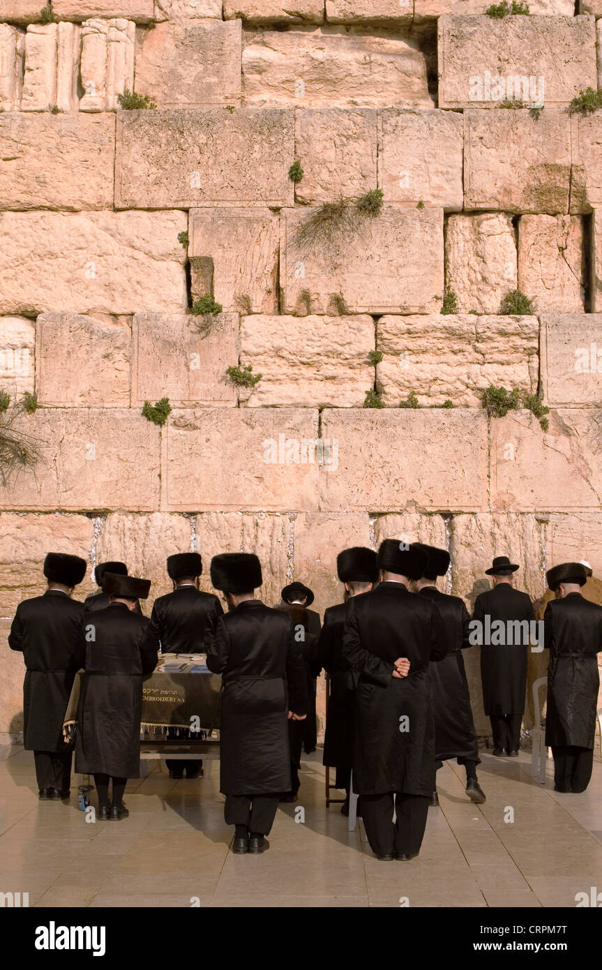 Hassidic Jews worship at the Old City's Western Wall, Jerusalem, Israel Stock Photo