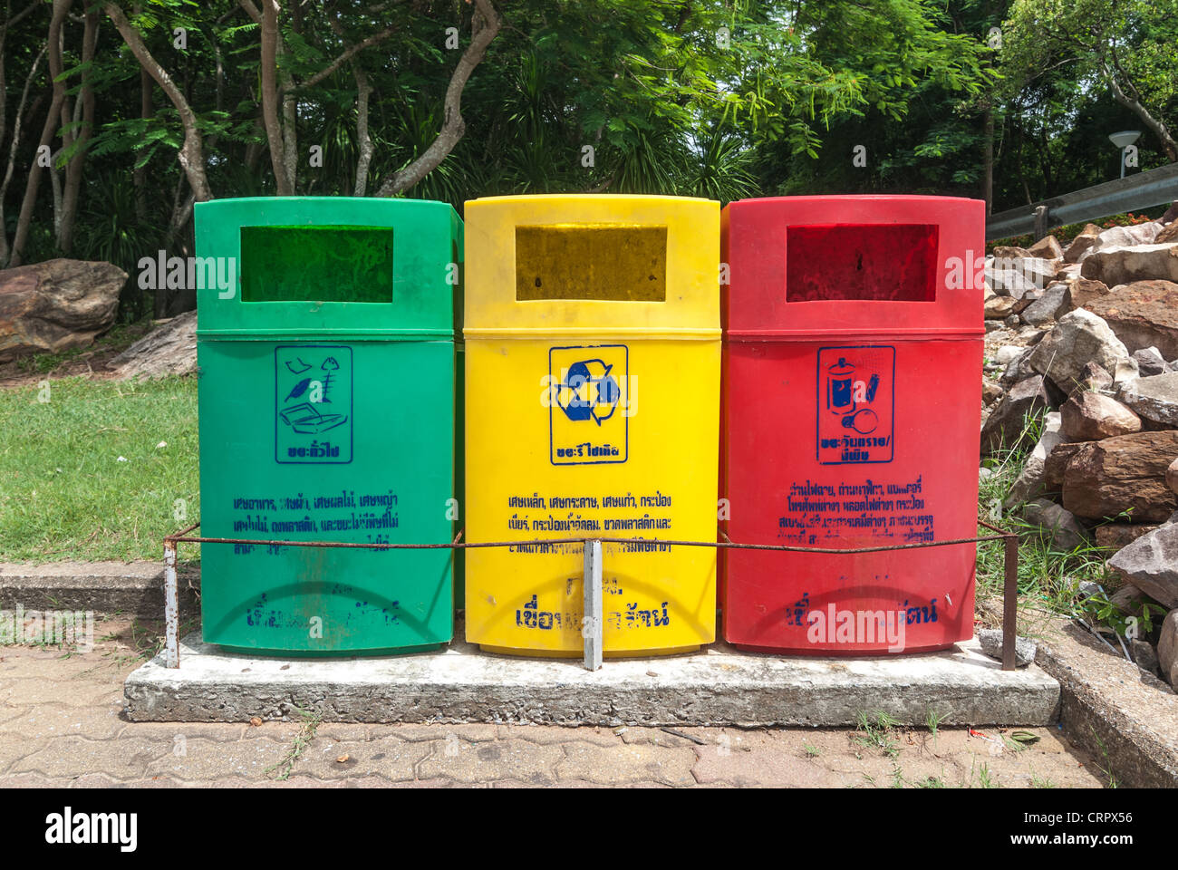 By the garbage bins. Divided into three colors Stock Photo Alamy