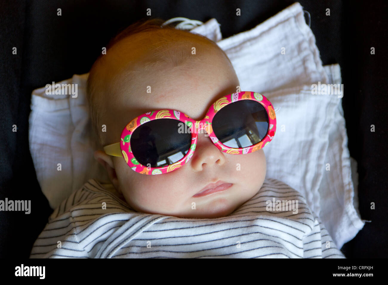 Baby wearing sunglasses Stock Photo Alamy