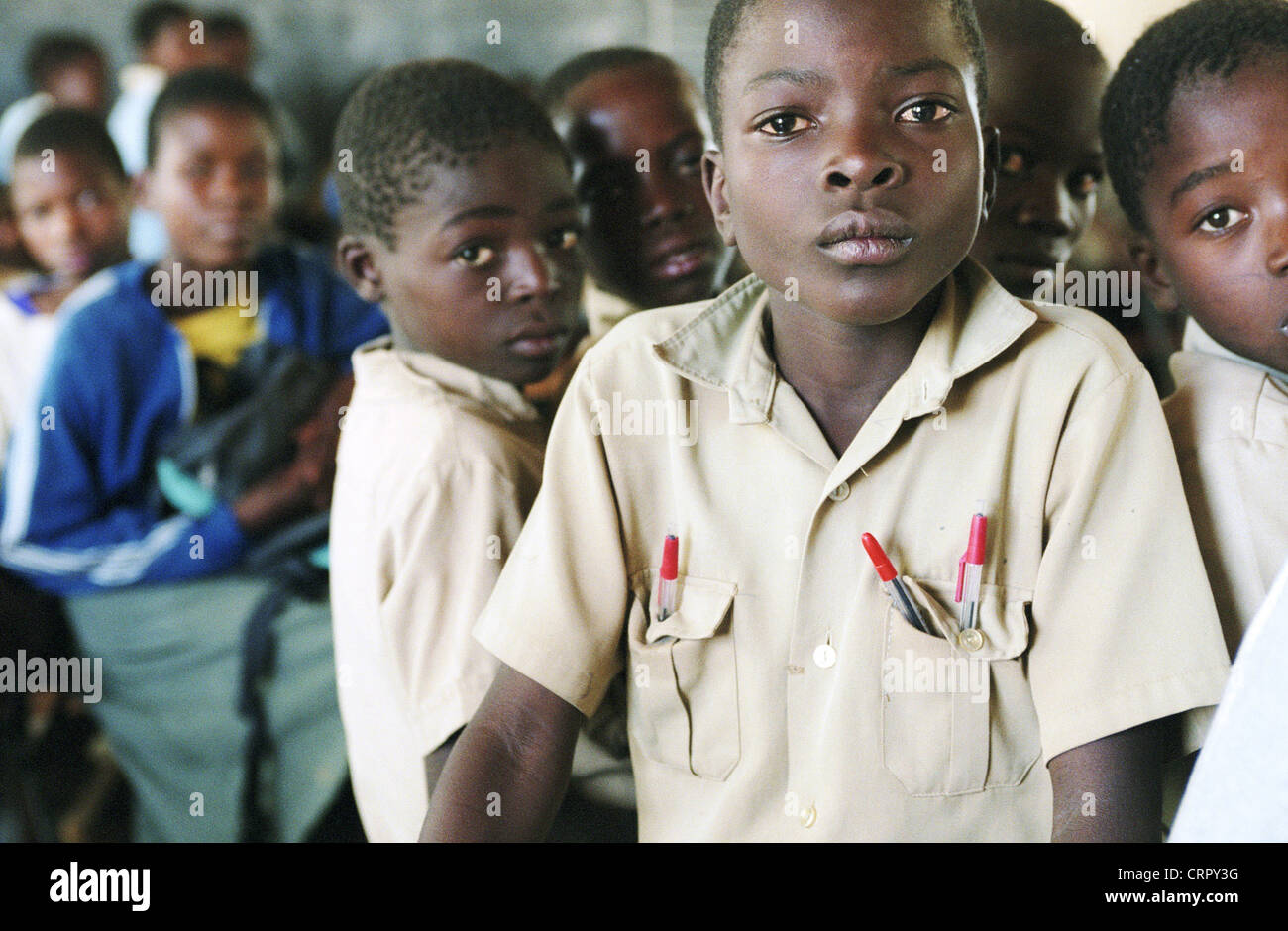 Students sitting in the classroom of a school Stock Photo