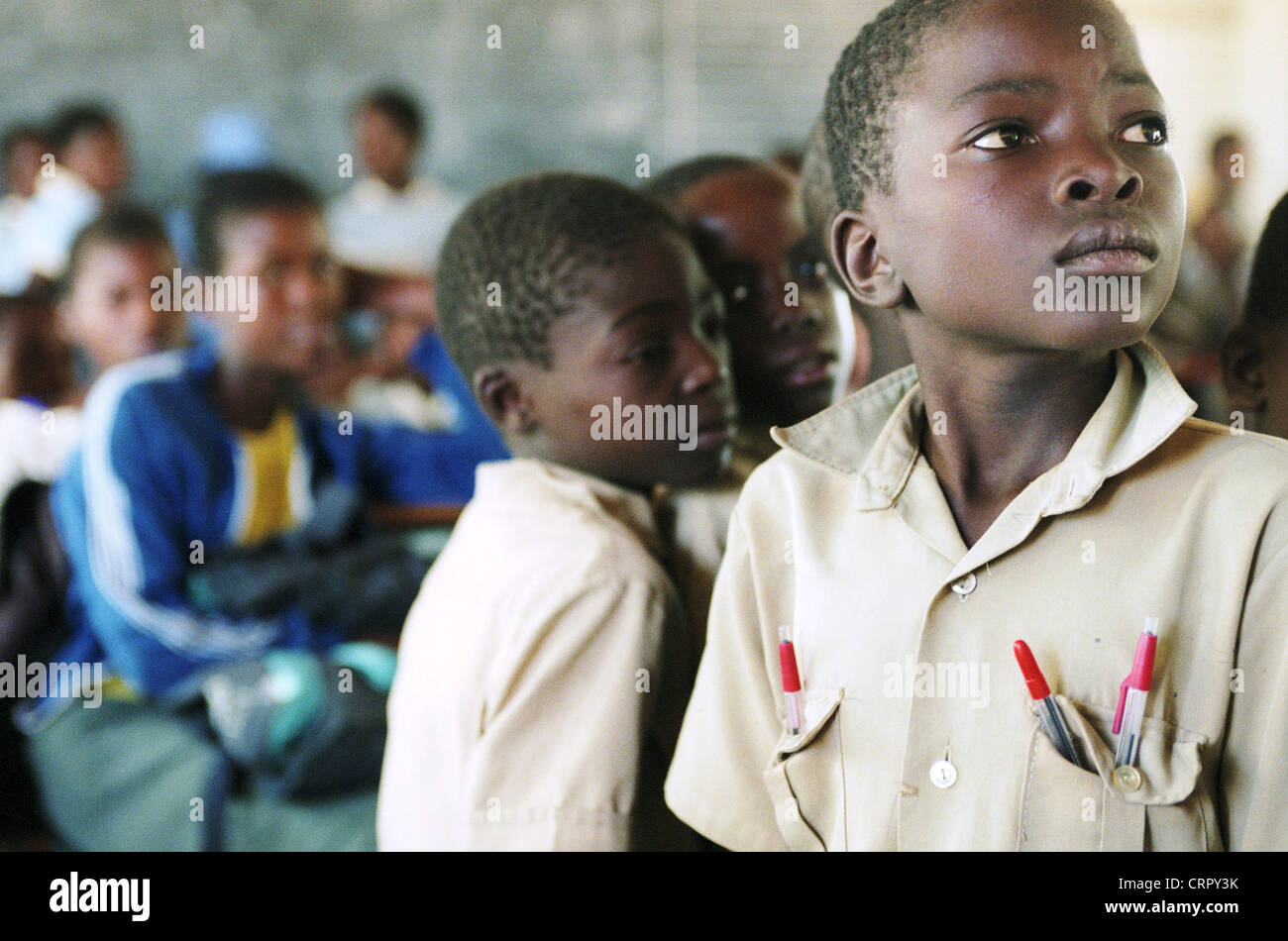 Students sitting in the classroom of a school Stock Photo - Alamy