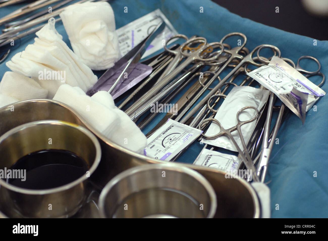 Surgical tools - Sutures, forceps, iodine and spirits sterile gauze Stock Photo