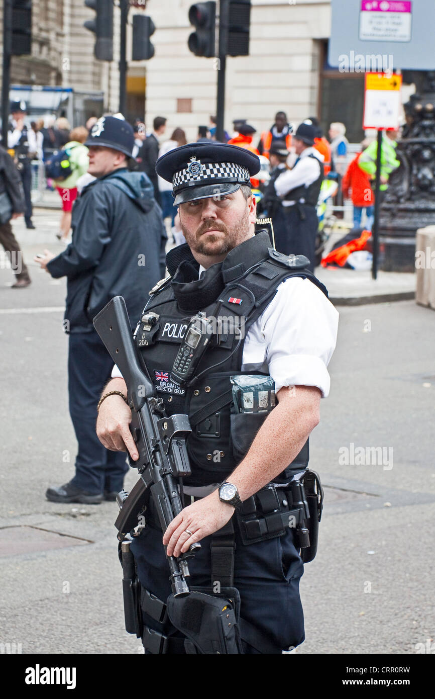 London, Trafalgar Square  An armed police officer June 2012 Stock Photo